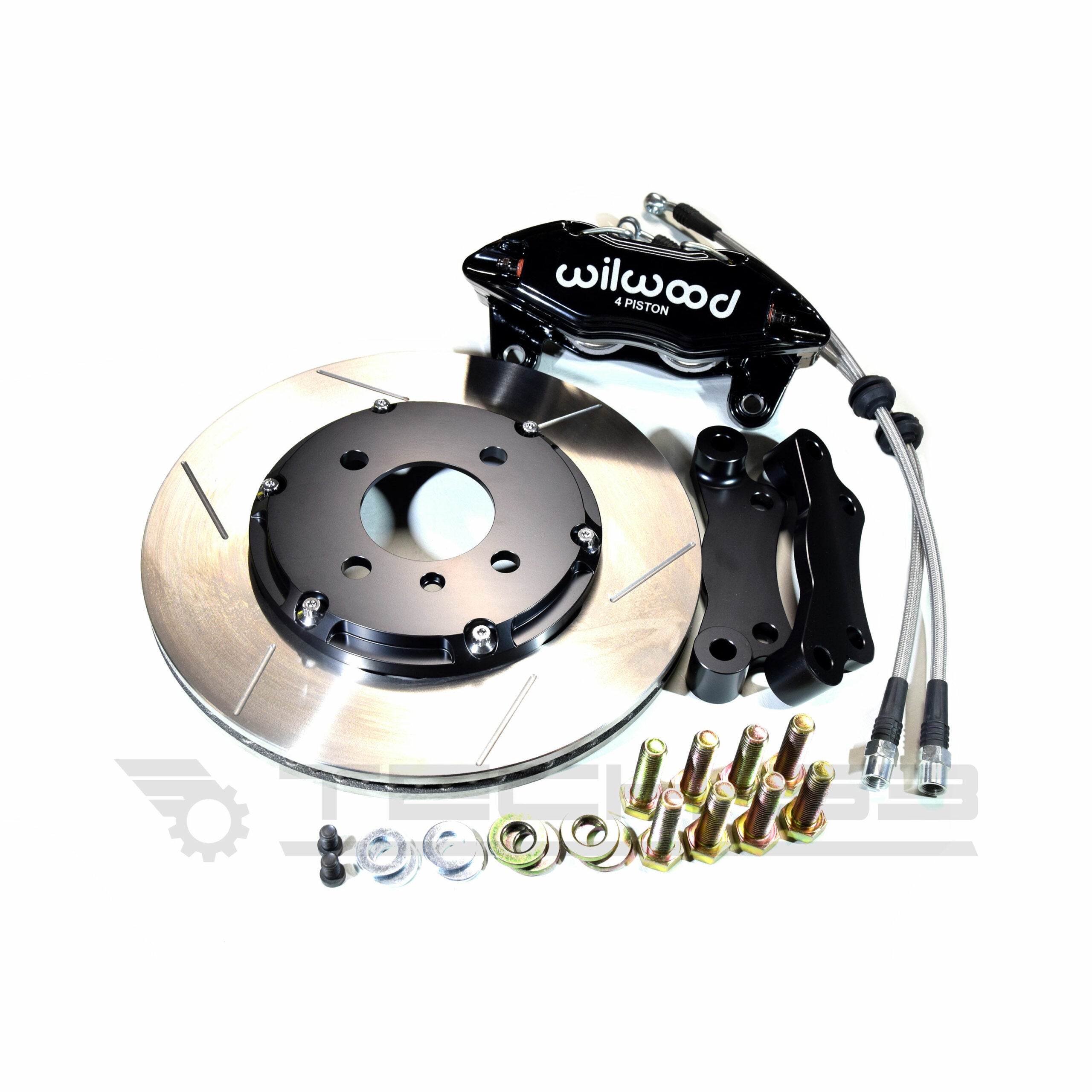 Front big brake kit for MK1 with black caliper, caliper adapters, brake disc, brake lines and hardware.